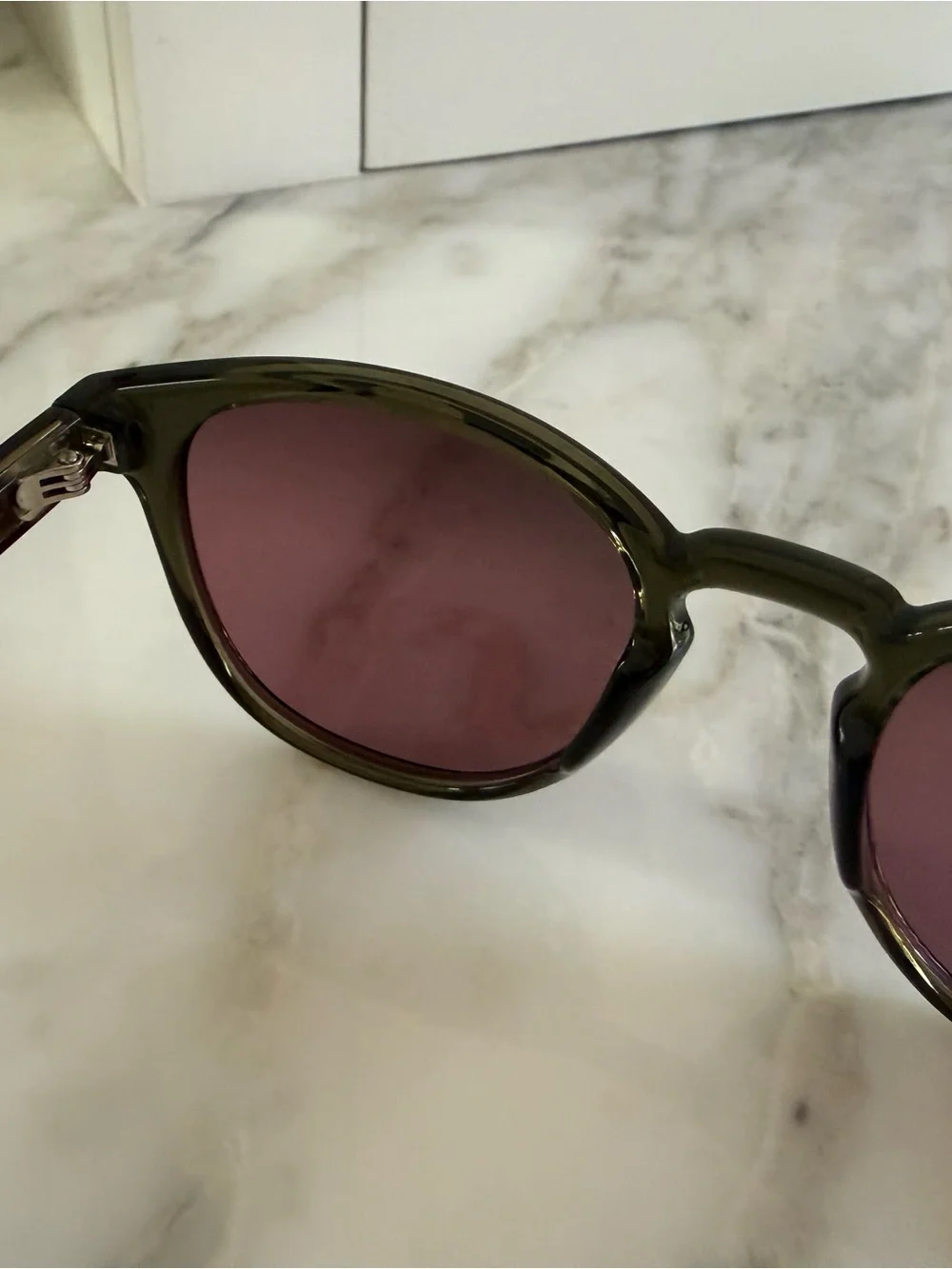 Maui Jim shiny trans green frame with Maui rose frame - polarized